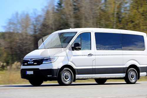Image of White MAN TGE 3.180 Minibus on Road