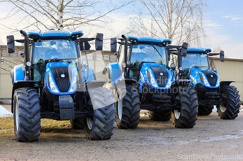 Image of Three New Holland T6 Series All-Purpose Tractors Parked