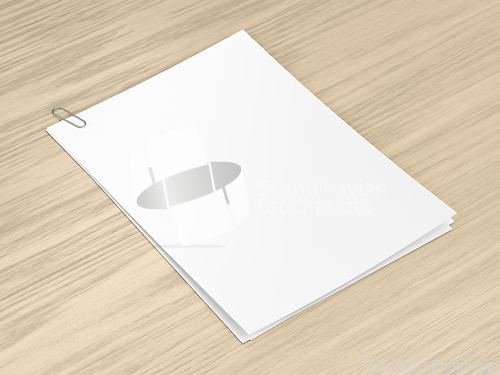 Image of Blank white papers attached with a paperclip