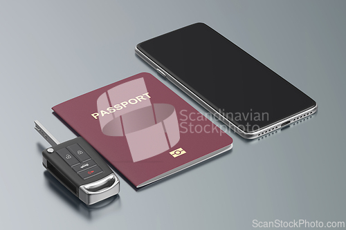 Image of Smartphone, passport and car key