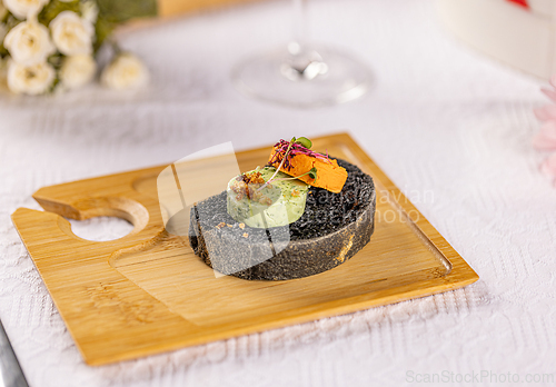 Image of Black bread canapes