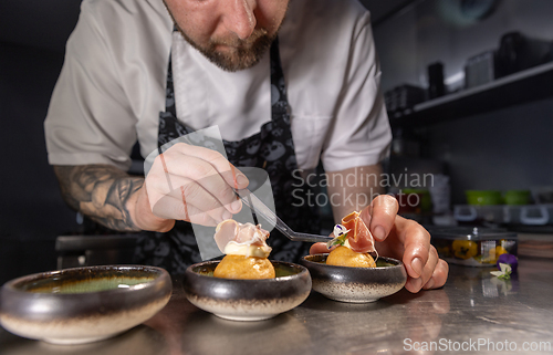 Image of Chef preparing gourmet appetizers