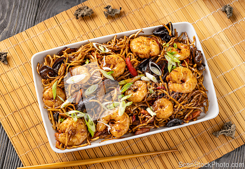 Image of Top view of shrimp and vegetable noodles