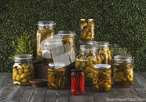 Image of Preserved food displaying variety of glass jars