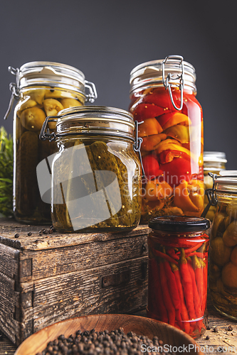 Image of Variety of pickles in glass jars