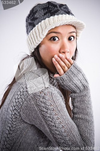 Image of Surprised beautiful asian woman
