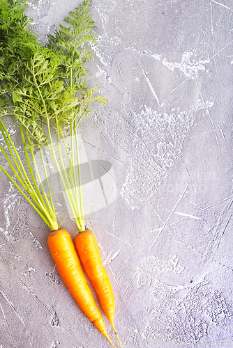 Image of An Image of Carrots on gray table