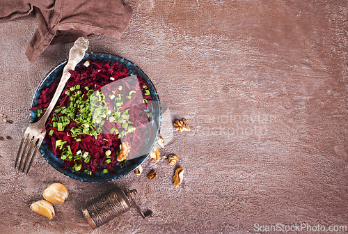 Image of Ripe beet salad with balsamic vinegar dressing and thyme.