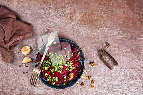 Image of Ripe beet salad with balsamic vinegar dressing and thyme.