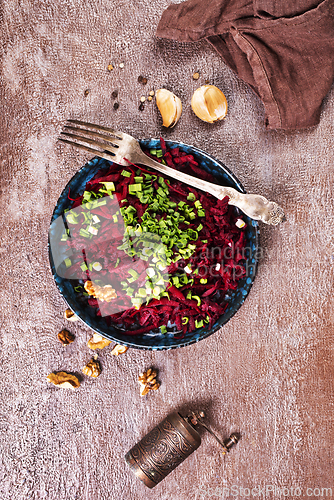 Image of Ripe beet salad with balsamic vinegar dressing and thyme.
