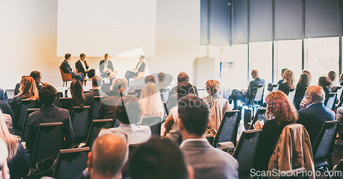 Image of Interview and round table discussion at business convention and presentation. Audience at the conference hall. Business and entrepreneurship symposium