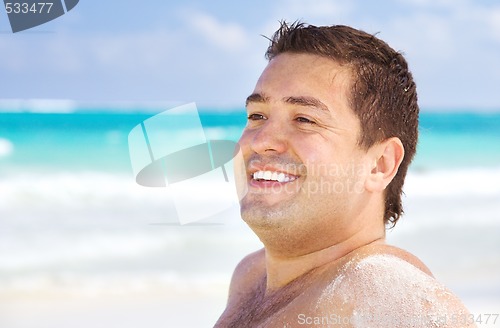 Image of happy man on the beach