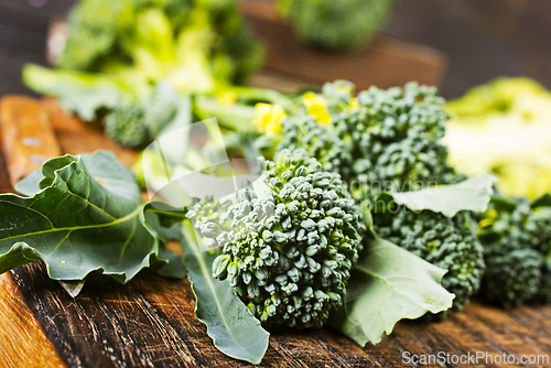 Image of raw broccoli on wooden board, diet food,
