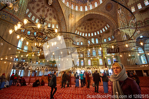 Image of Istanbul, Turkey - 1 April, 2017: Interior of blue Mosque also called Sultan Ahmed Mosque or Sultan Ahmet Mosque in Istanbul, Turkey.Ceiling decorations with Islamic elements of Sultan Ahmed Mosque do