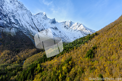 Image of Majestic mountain landscape with snow-capped peaks and vibrant a