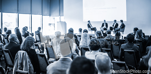 Image of Interview and round table discussion at business convention and presentation. Audience at the conference hall. Business and entrepreneurship symposium