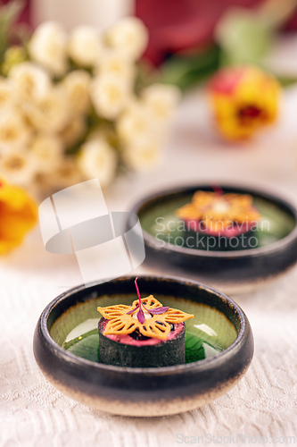 Image of Gourmet appetizers being served on small plates Gourmet appetize