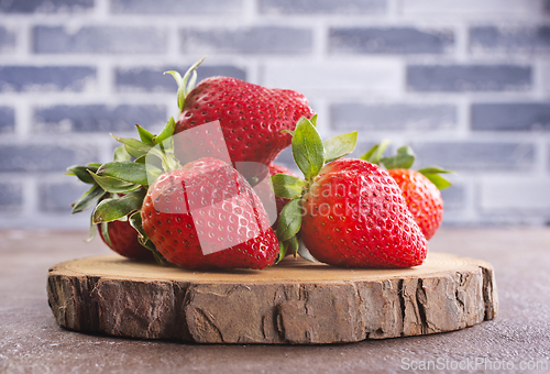 Image of strawberry on wooden board, fresh strowberry