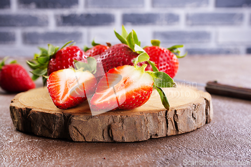 Image of strawberry on wooden board, fresh strowberry