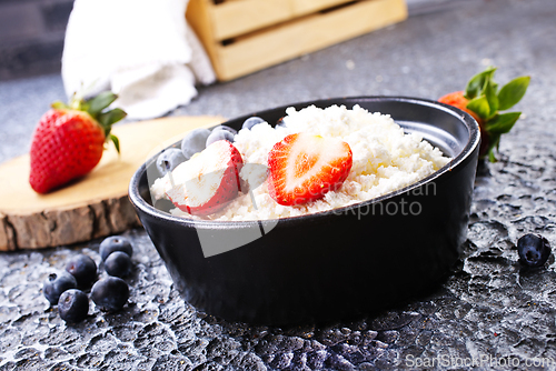 Image of cottage cheese with fresh berries for a healthy breakfast
