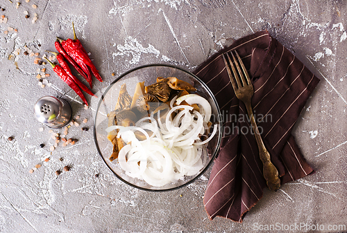 Image of Marinated mushrooms in a glass bowl
