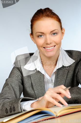 Image of Beautiful redhead businesswoman