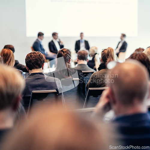 Image of Interview and round table discussion at business convention and presentation. Audience at the conference hall. Business and entrepreneurship symposium