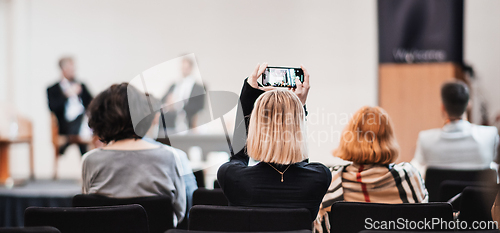 Image of Interview and round table discussion at business convention and presentation. Audience at the conference hall. Business and entrepreneurship symposium