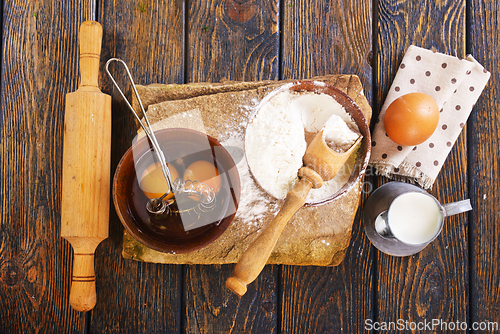 Image of Baking background. Ingredients, kitchen utensils for baking cakes and cookies.