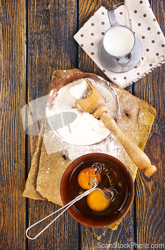 Image of Baking background. Ingredients, kitchen utensils for baking cakes and cookies.