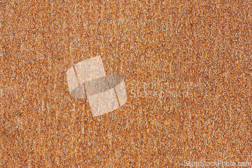 Image of Rusty metal plate with textured surface showing signs of age and