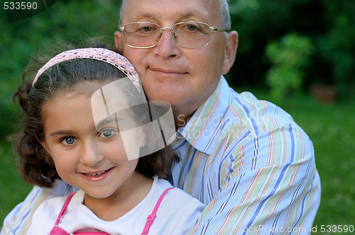 Image of Happy grandfather and kid outdoors