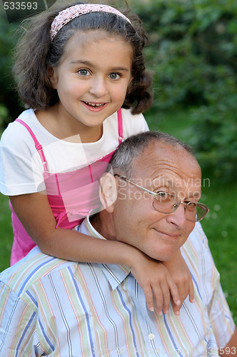 Image of Happy grandfather and kid outdoors