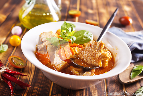 Image of Homemade meat and vegetable stew or soup with tomato