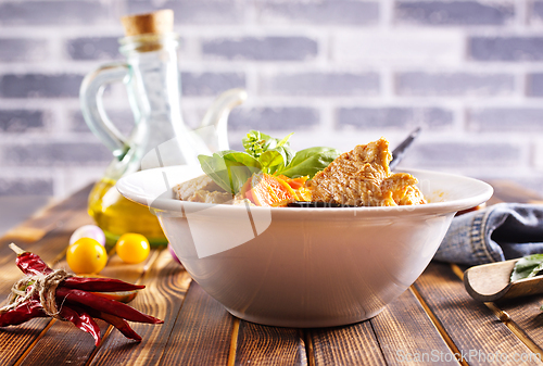 Image of Homemade meat and vegetable stew or soup with tomato
