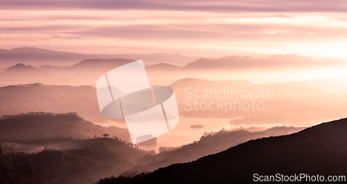 Image of View from Adam's peak, Sri Lanka. Valley view with lakes and mountains at sunrise