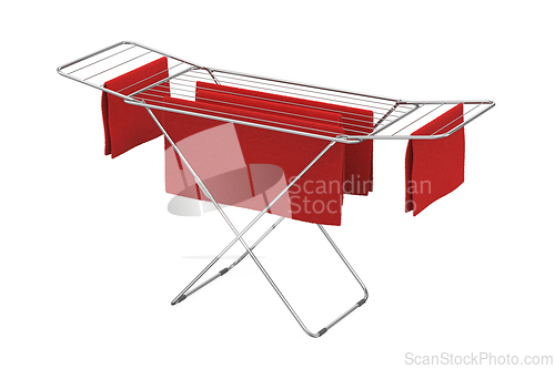 Image of Red towels drying on a clothes drying rack