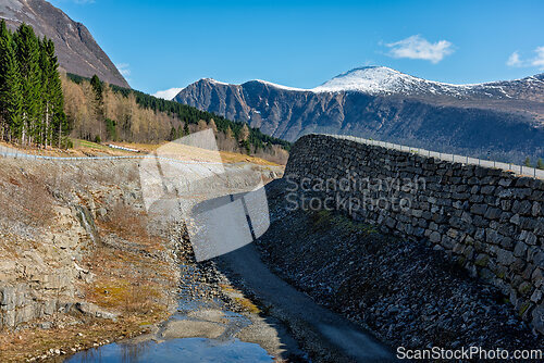 Image of Landslide prevention measures along a mountain road in a scenic 