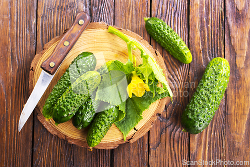 Image of fresh cucumbers on board
