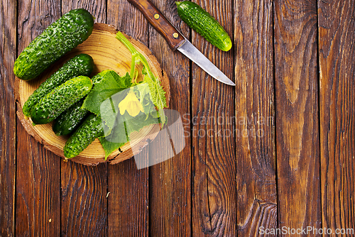 Image of fresh cucumbers on board