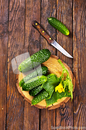 Image of fresh cucumbers on board