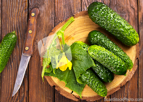 Image of fresh cucumbers on board
