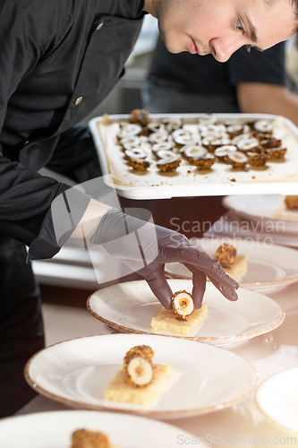 Image of Chef preparing tasty starters