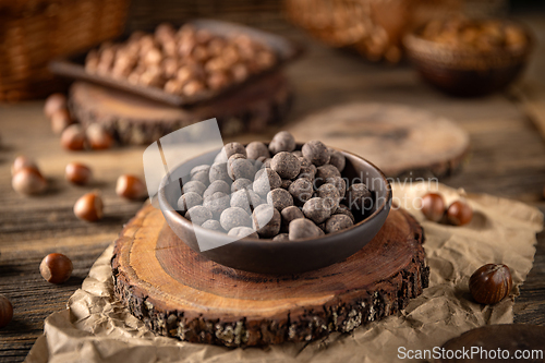 Image of Chocolate covered hazelnuts in bowl