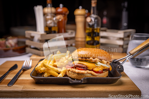 Image of Delicious hamburger with french fries
