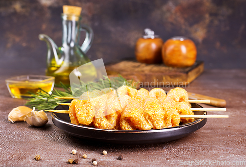 Image of Raw chicken meat shish kebab skewers. chicken with spice