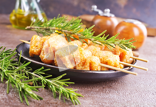 Image of Raw chicken meat shish kebab skewers. chicken with spice