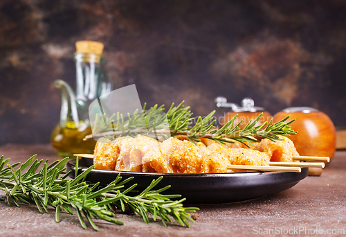 Image of Raw chicken meat shish kebab skewers. chicken with spice
