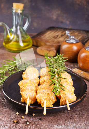 Image of Raw chicken meat shish kebab skewers. chicken with spice