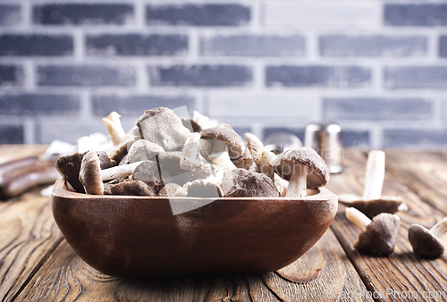 Image of Beautiful edible forest mushroom in bowl